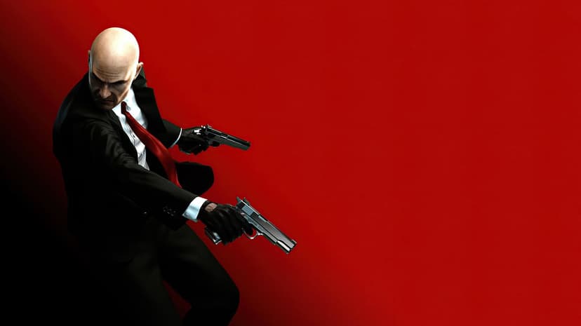 Agent 47 in a black suit aiming dual silver pistols against a vibrant red background with dramatic lighting.