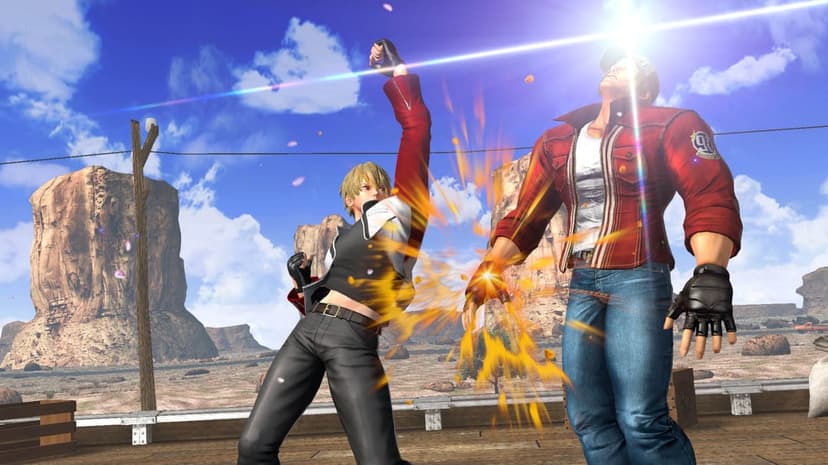 Rock Howard strikes Terry Bogard with a glowing energy punch in a desert canyon under a bright sunny sky.