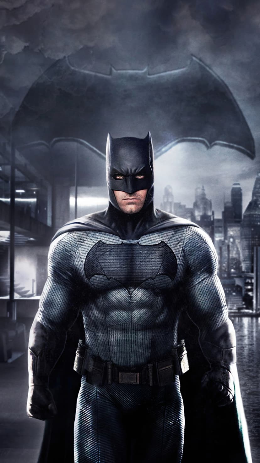Batman wears textured tactical armor with a large bat symbol against a dark Gotham City sky with a signal.