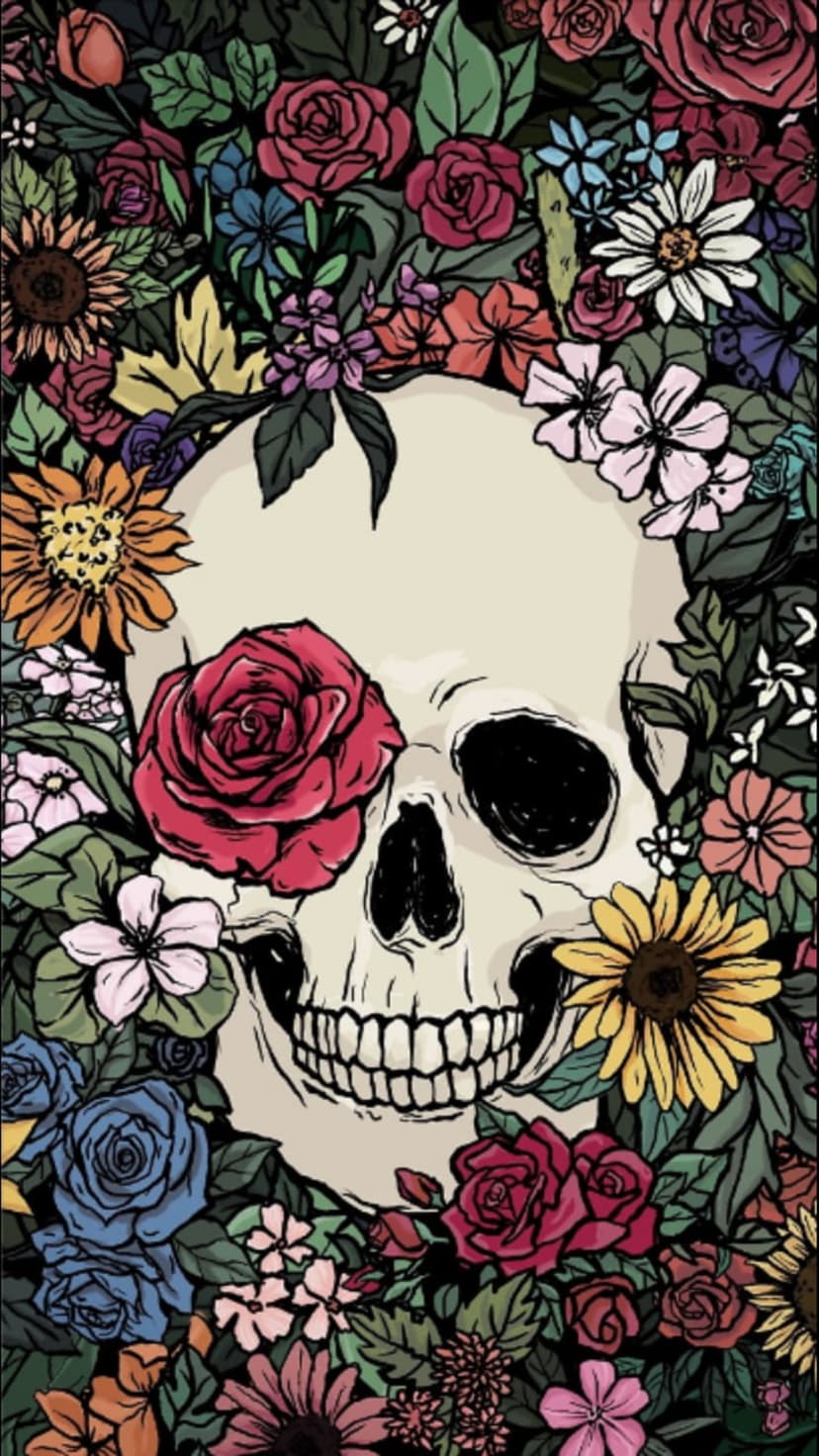 Human skull with red roses and sunflowers, featuring a single rose in the eye socket and dark green foliage.