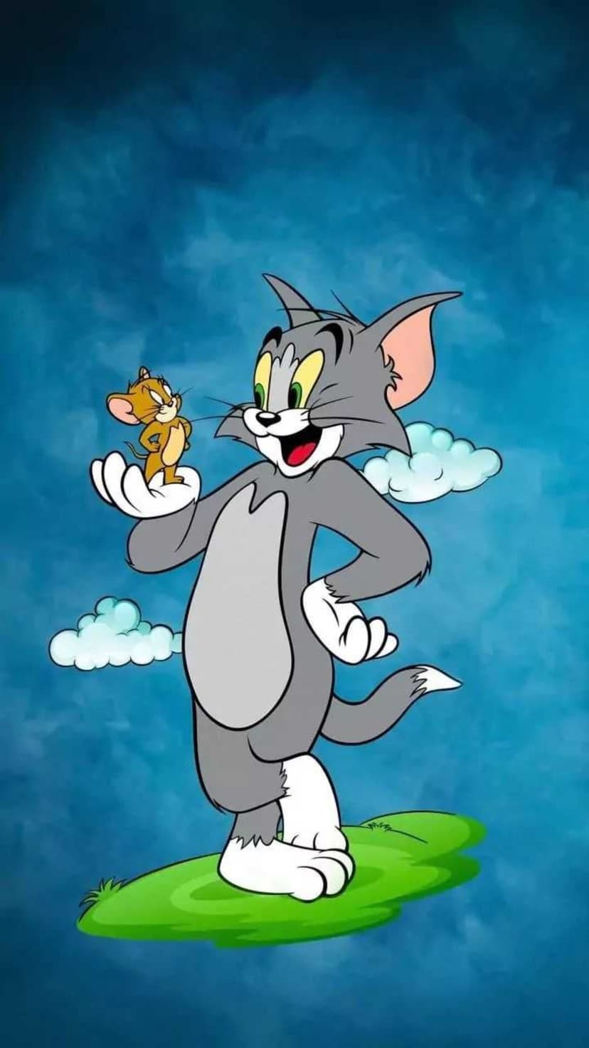 Tom the cat smiling while holding Jerry the mouse on his palm over a green field and a cloudy blue sky backdrop.