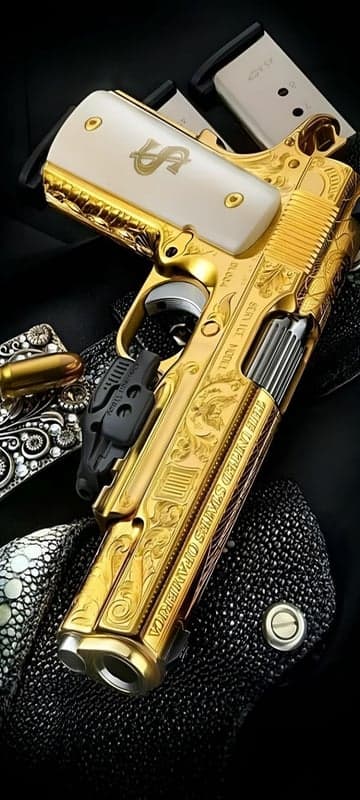 Ornate Gold-Plated Pistol with Dollar Sign Grips