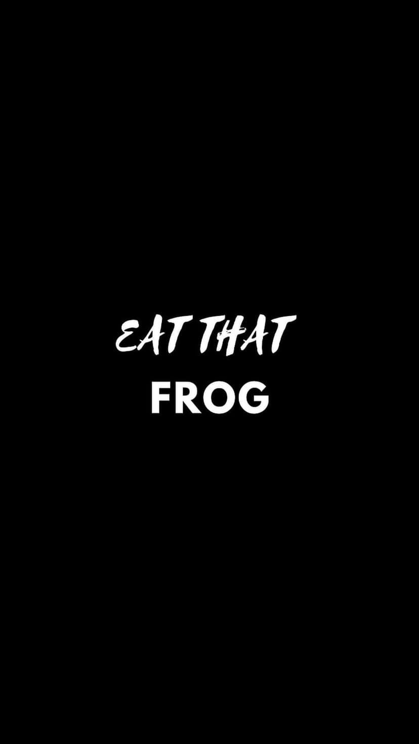 Bold white text reading Eat That Frog centered on a solid matte black background with clean typographic alignment.