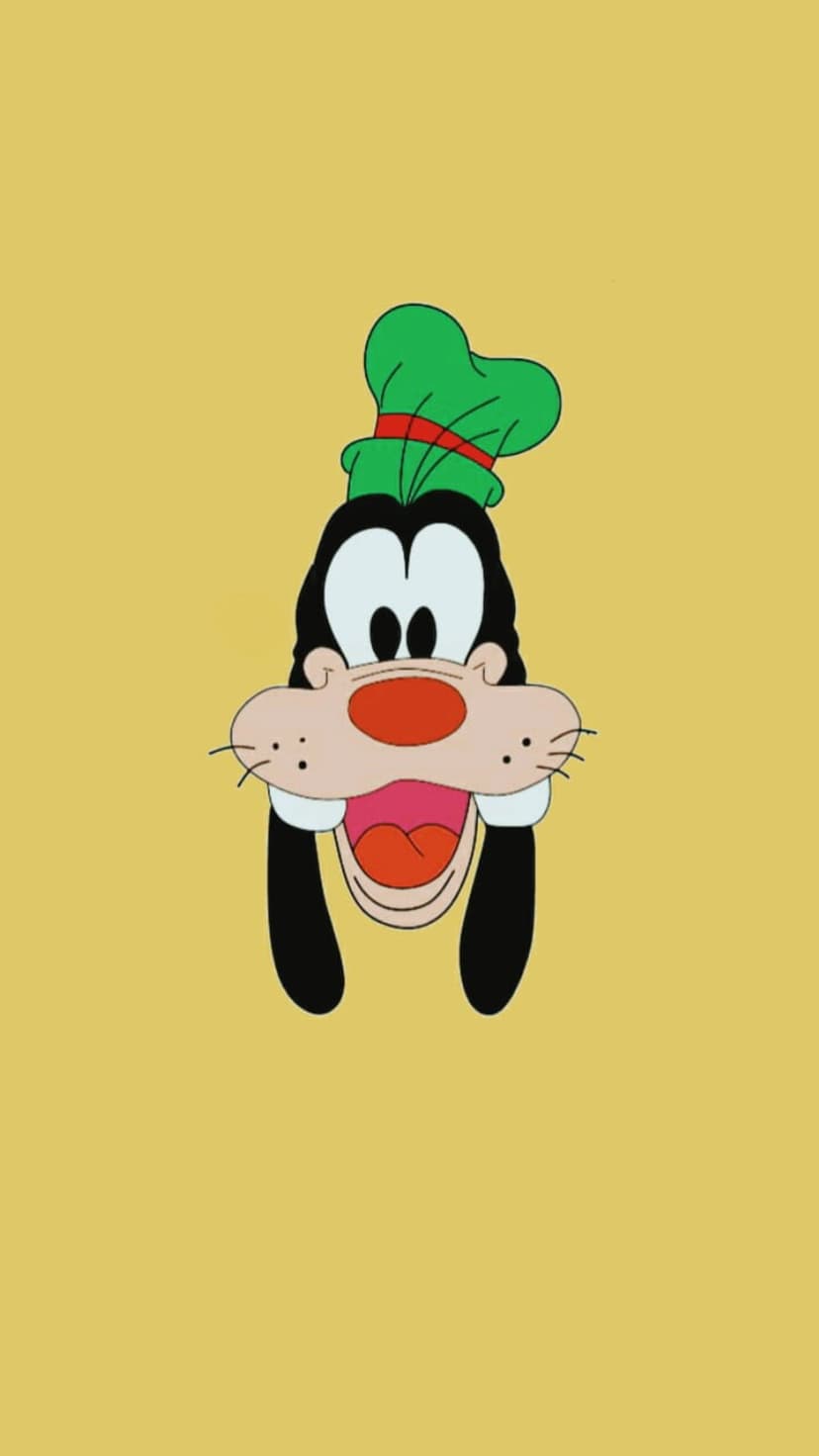 Goofy with a wide smile, long black ears, and a green hat centered on a solid yellow background for mobile screens.