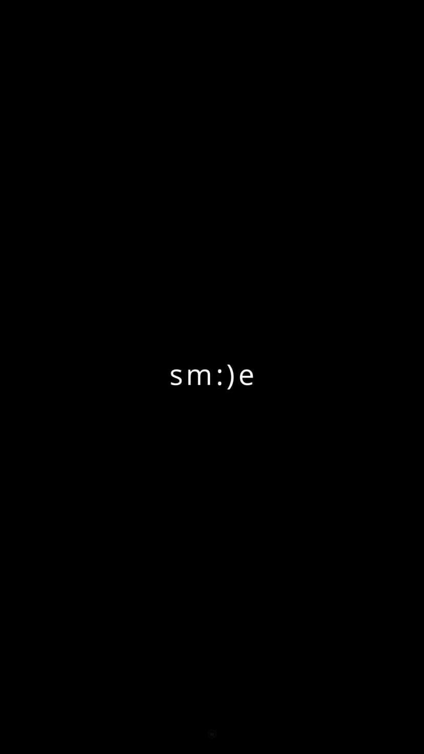 White smile text with an emoticon face centered on a solid black background for a clean vertical mobile layout.