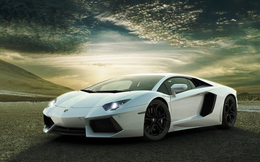 White Lamborghini Aventador parked on a gravel road beneath a dramatic, swirling cloudy sky at dusk.