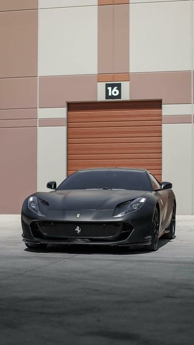 Stealth Matte Black Ferrari Supercar Portrait Wallpaper