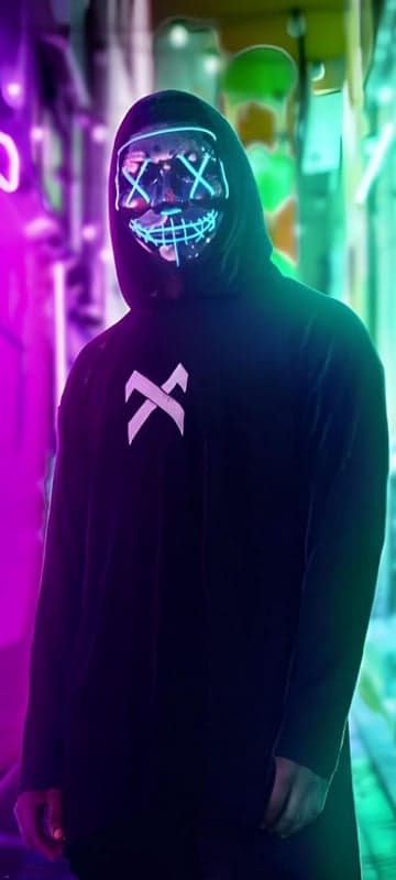 Person in Neon Mask and Hoodie in Cyberpunk City