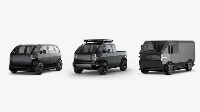 Three futuristic electric vehicles in black and grey arranged on a white background with studio lighting.