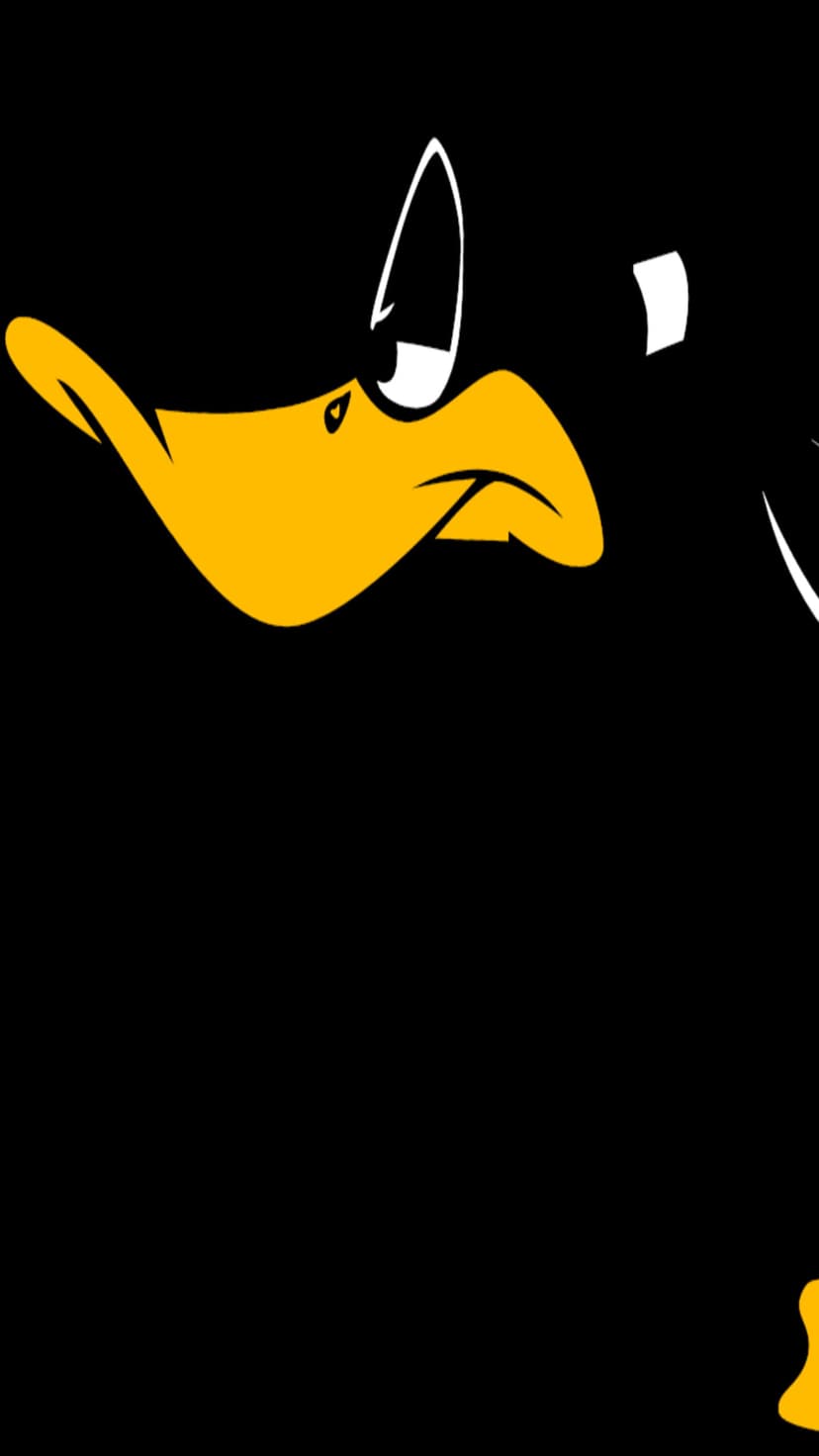 Daffy Duck features a vibrant yellow beak and large white eye positioned against a flat black backdrop.
