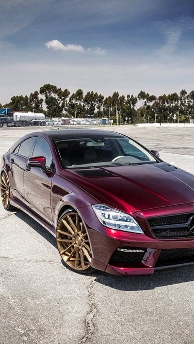 Customized Red Mercedes CLS with Gold Wheels