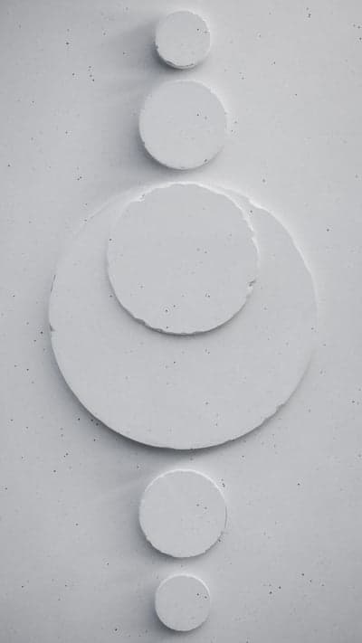Minimalist White Circles on Textured Background