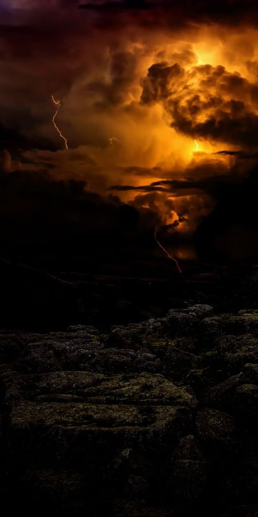 Electric lightning bolts strike through orange storm clouds above a dark, mossy rocky mountain landscape.