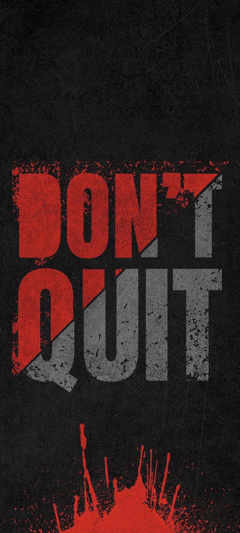 Don't Quit text in distressed red and grey font over a dark textured surface with a large red paint splatter.