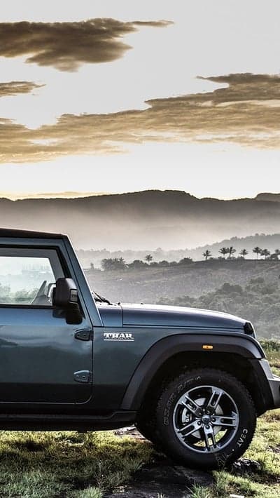 Blue Mahindra Thar SUV Mountain Sunset Mobile Wallpaper