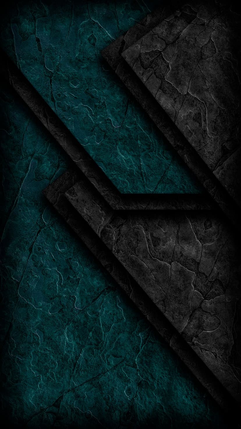 Dark teal and black stone slabs with sharp geometric edges and dramatic lighting in a vertical composition.