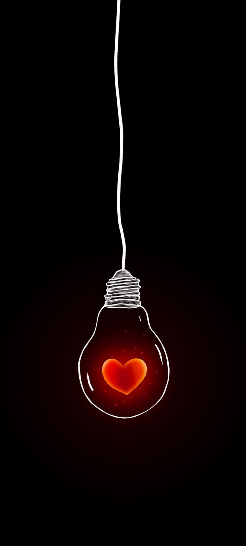 Red glowing heart inside a black light bulb silhouette hanging by a thin cord against a dark background.