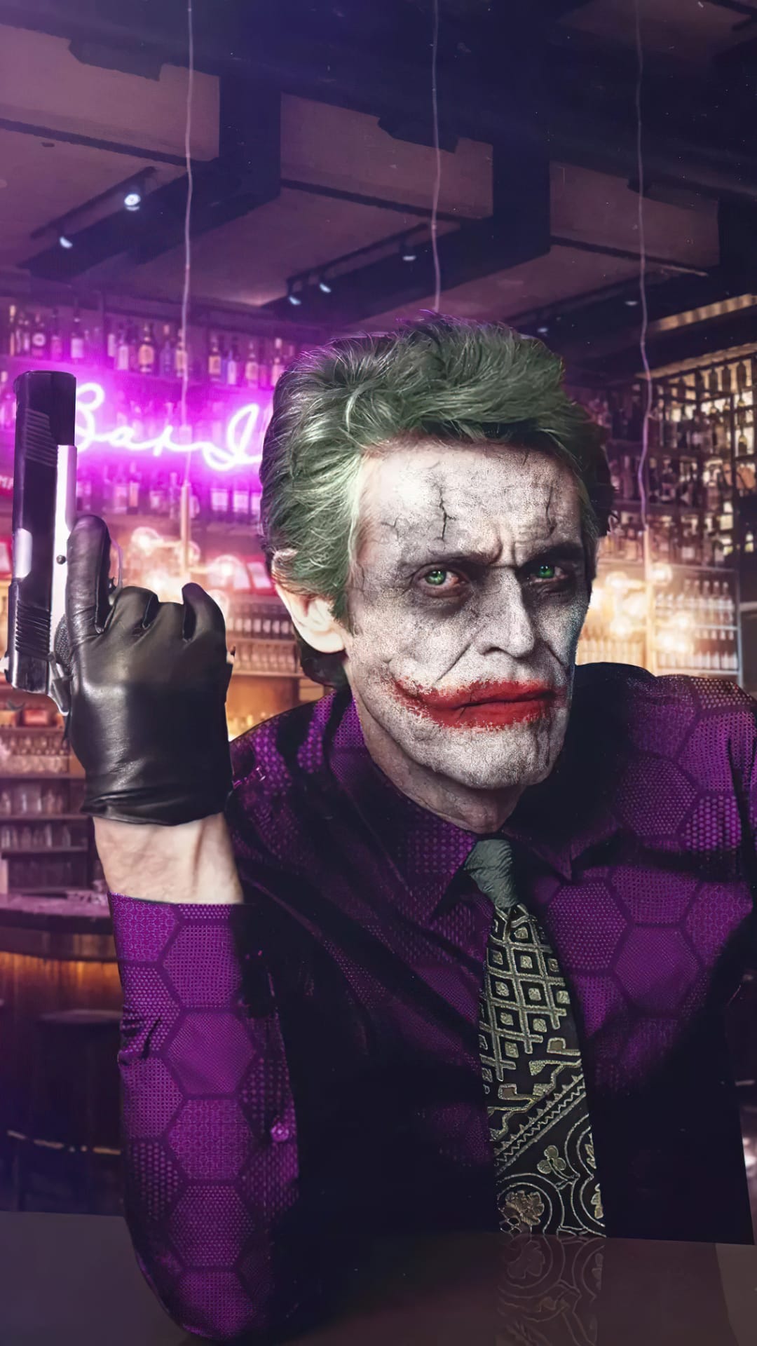 Willem Dafoe as Joker with green hair holds a handgun in a neon-lit bar for a vertical mobile phone background.