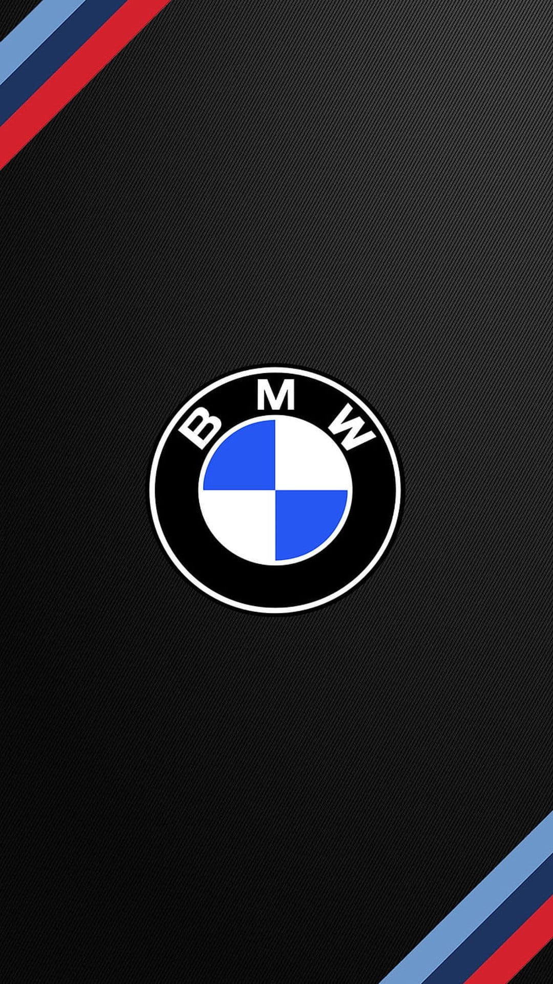 BMW emblem centered on a black carbon fiber weave background with blue and red stripes in the corners.