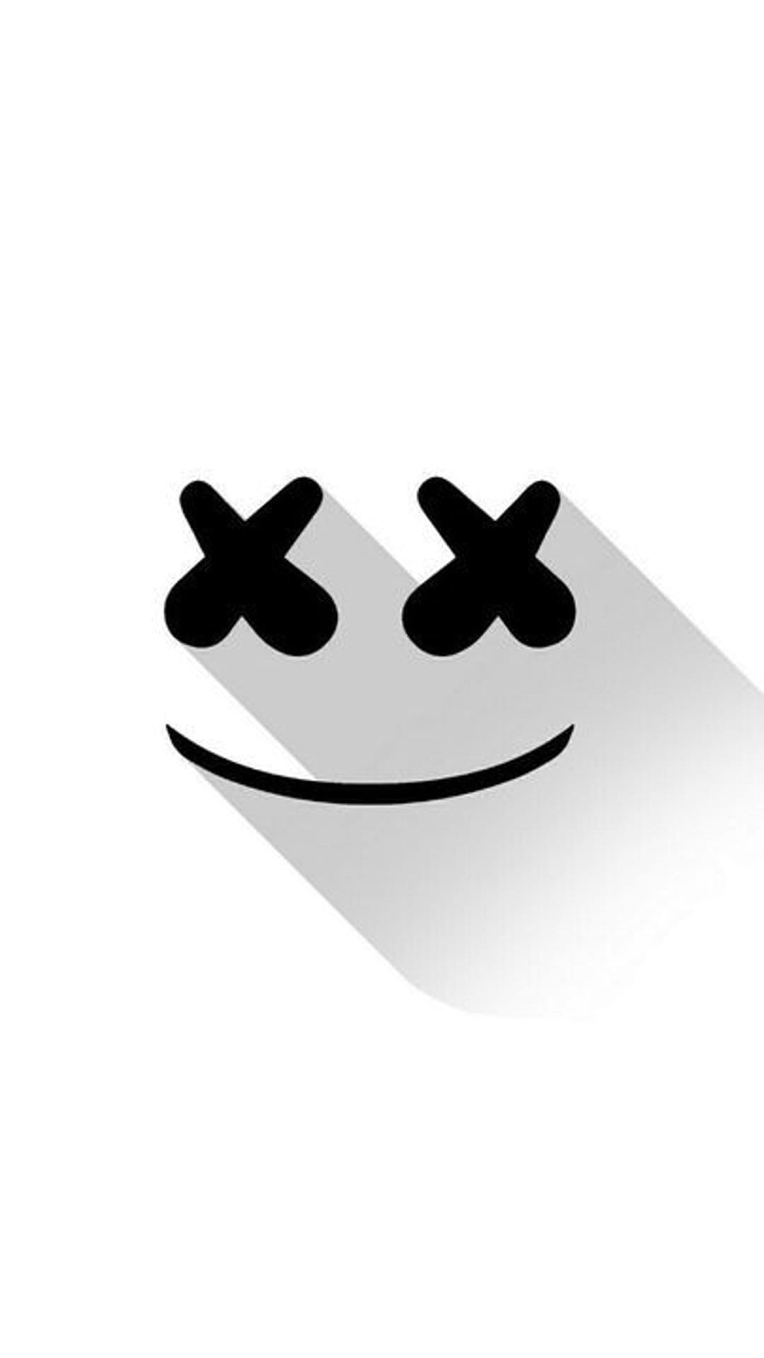 Marshmello helmet logo with X eyes and a smile casts a long grey shadow against a solid white background.