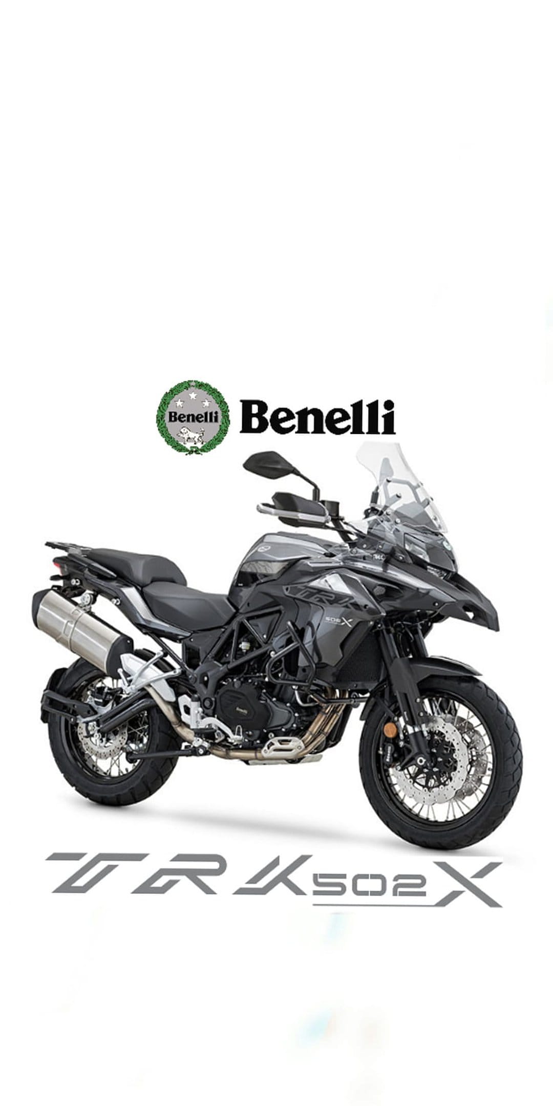 Benelli TRK 502X adventure motorcycle features a silver fairing and rugged tires on a scenic mountain road.