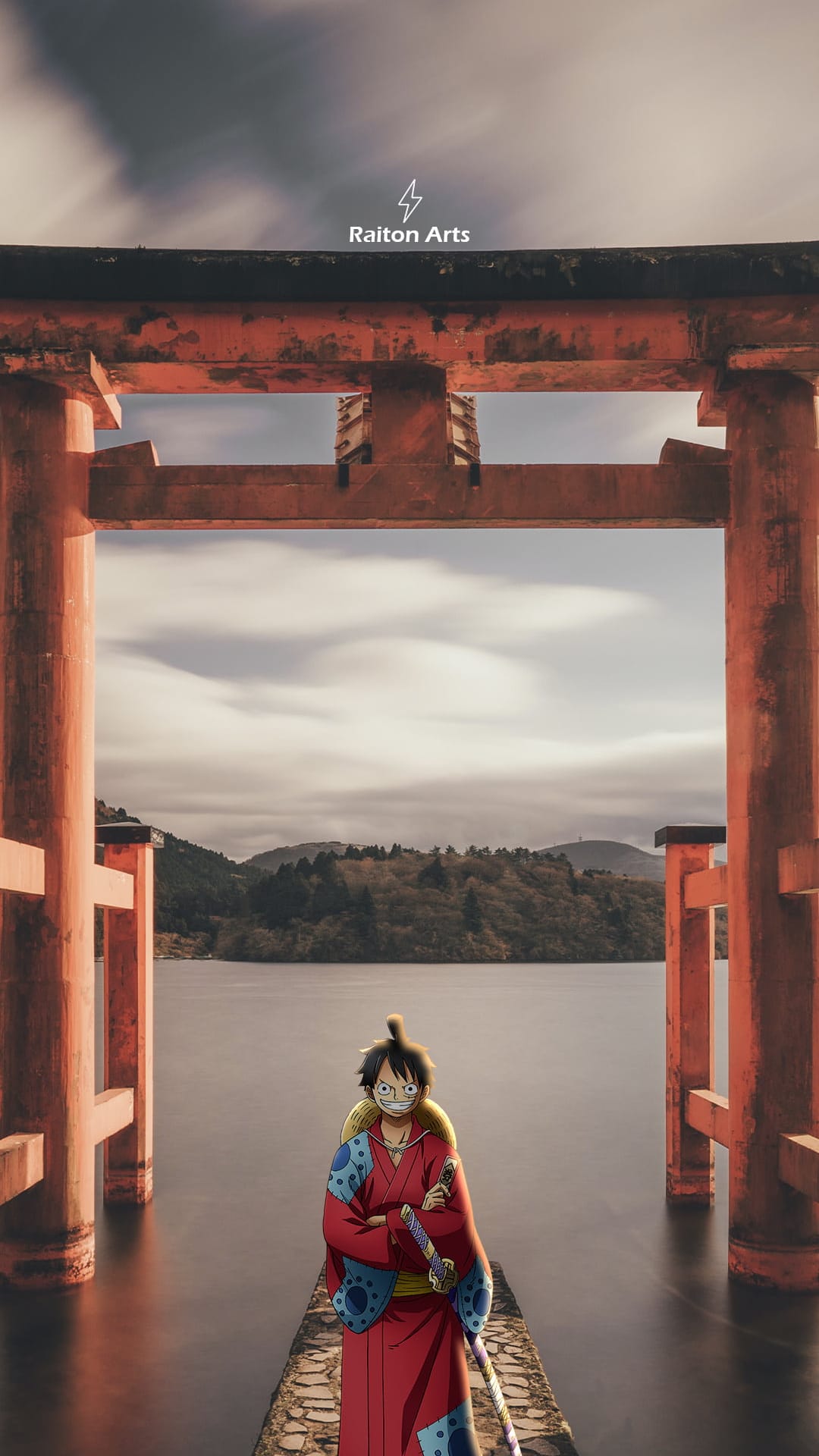 Monkey D. Luffy standing on a stone path facing a red Torii gate with a serene lake and misty hills behind him.