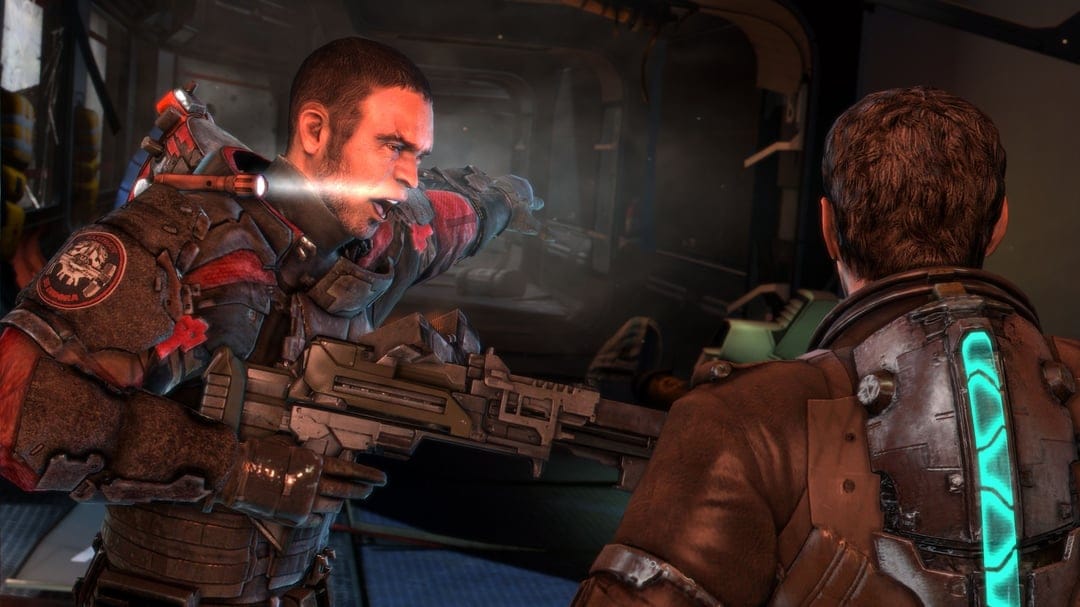 John Carver shouting at Isaac Clarke in a gritty sci-fi corridor with a glowing cyan RIG health bar.