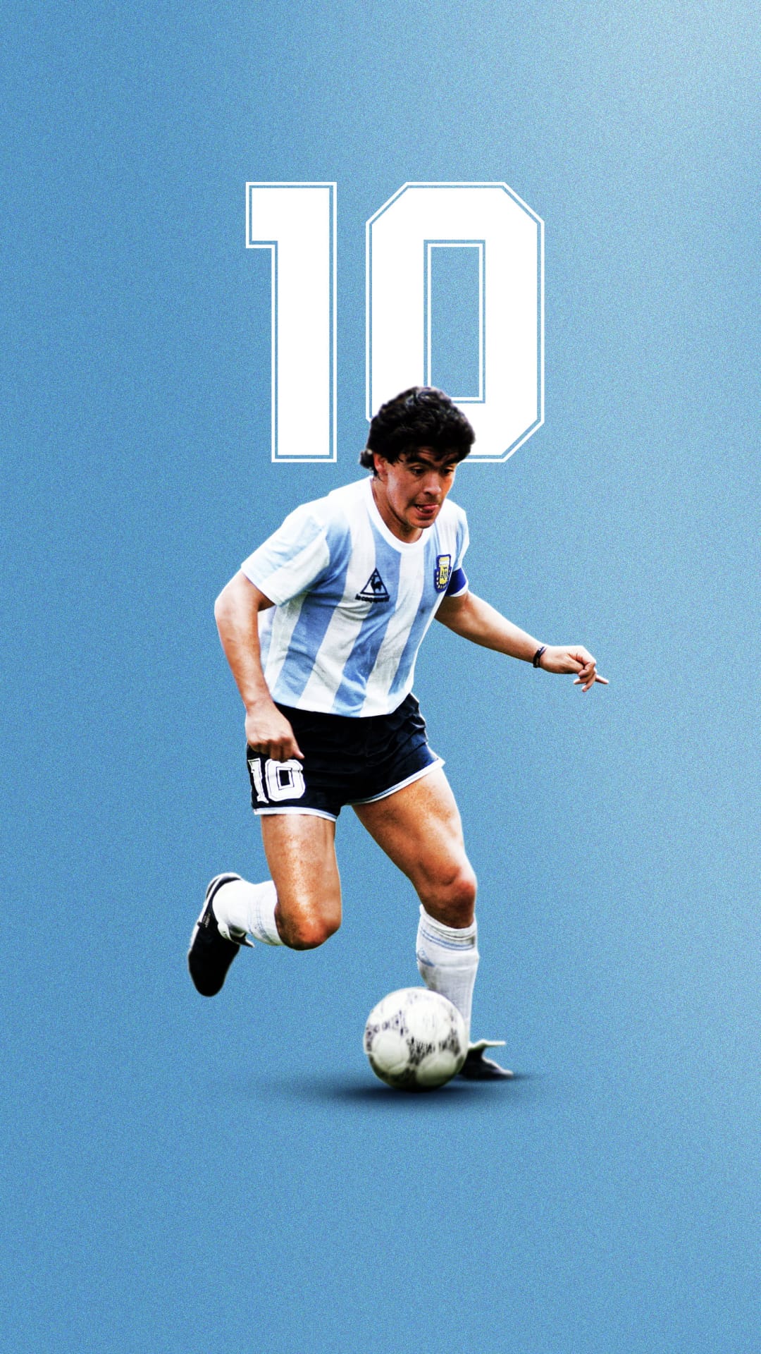 Diego Maradona dribbles a soccer ball in a blue and white striped Argentina kit with the number ten visible.