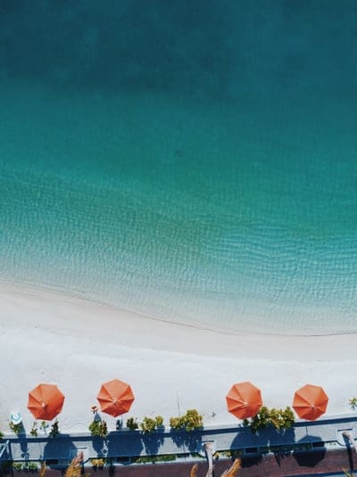 sea,ocean,blue,water,waves,nature,white,sand,beach,coast,shore,aerial,view,landscape,umbrella,iphone wallpaper