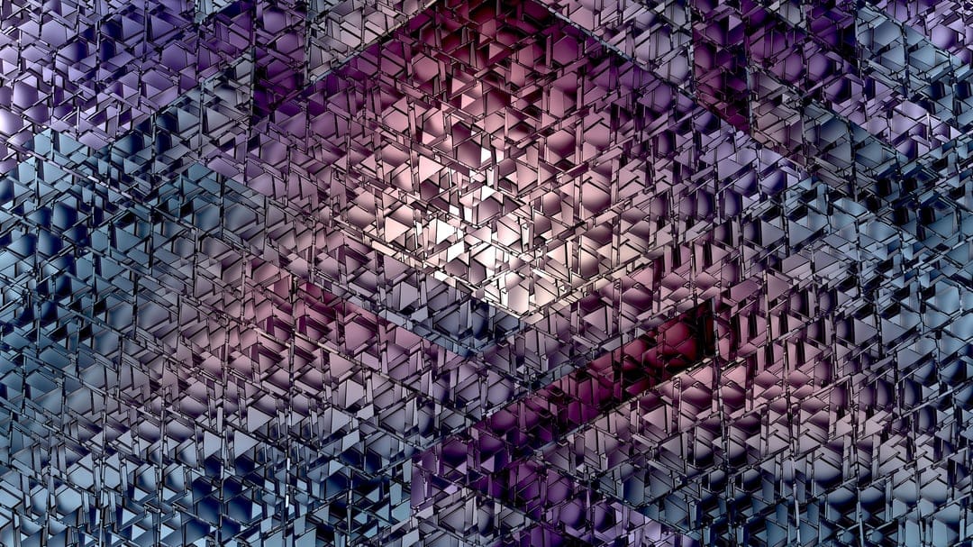 Interlocking purple and blue hexagonal prisms with sharp edges and reflective facets create a deep 3D pattern.