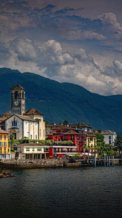 Town, lake, mountains, nature, architecture, peaceful, serene, tranquil, beautiful, outdoor, reflections, sky, clouds, colorful, European, historic, picturesque, vibrant, waterfront, charming
