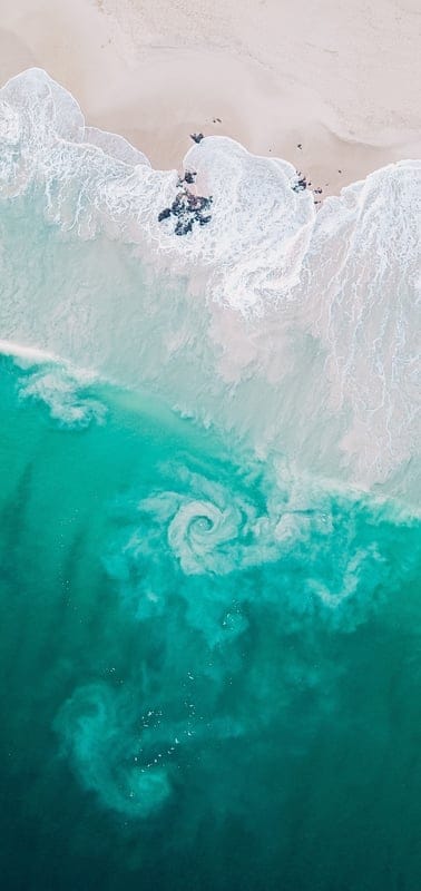 Ocean, beach, aerial, nature, vibrant, blue, sand, waves, peaceful, tranquil, beautiful, outdoor, coastal, foam, pattern, pristine, serene, turquoise, seascape, swirl