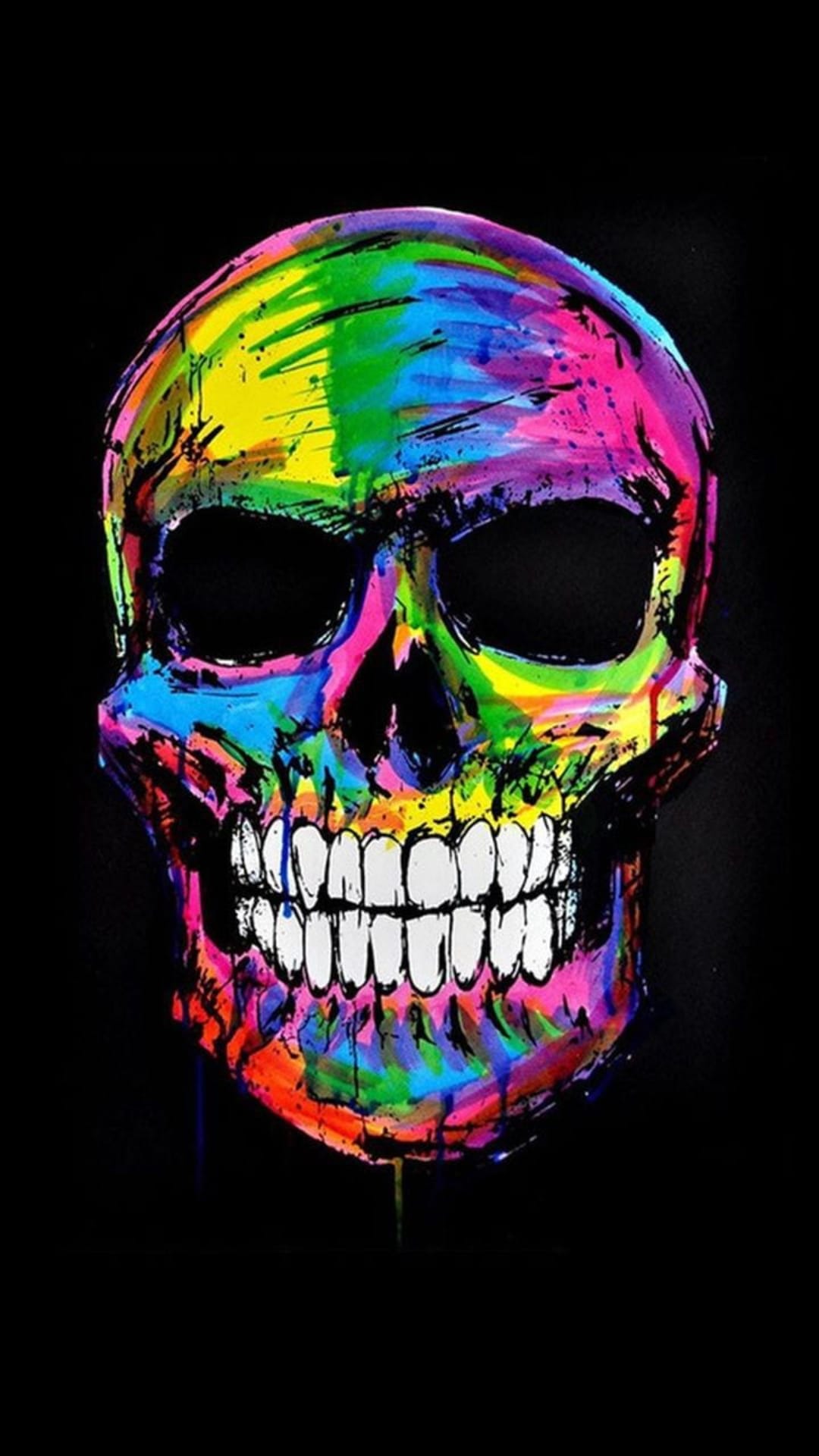 Human skull with rainbow colored paint splatters and white teeth centered on a solid black background.