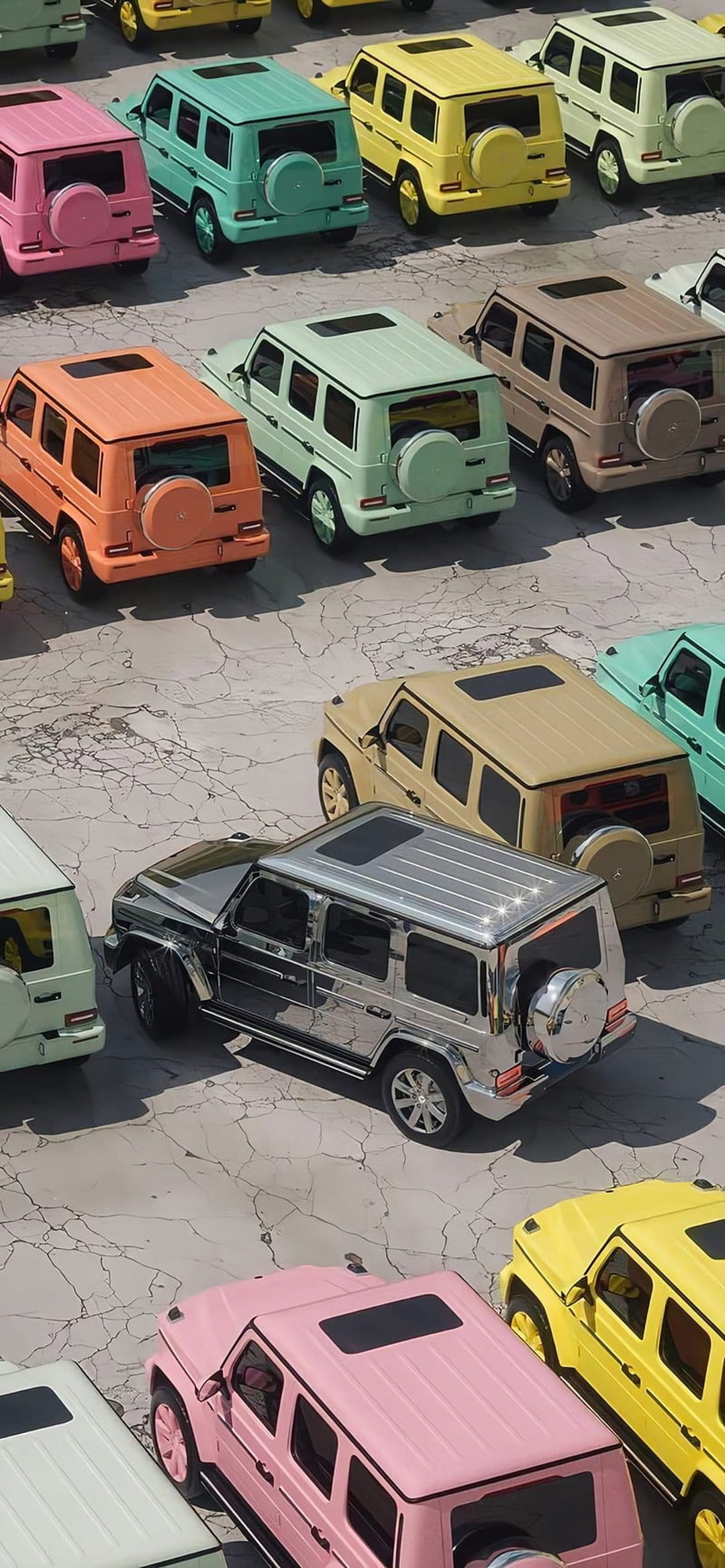 Mercedes G-Wagon SUVs in pastel pink, mint, and orange park on asphalt, showing custom luxury vehicle finishes.