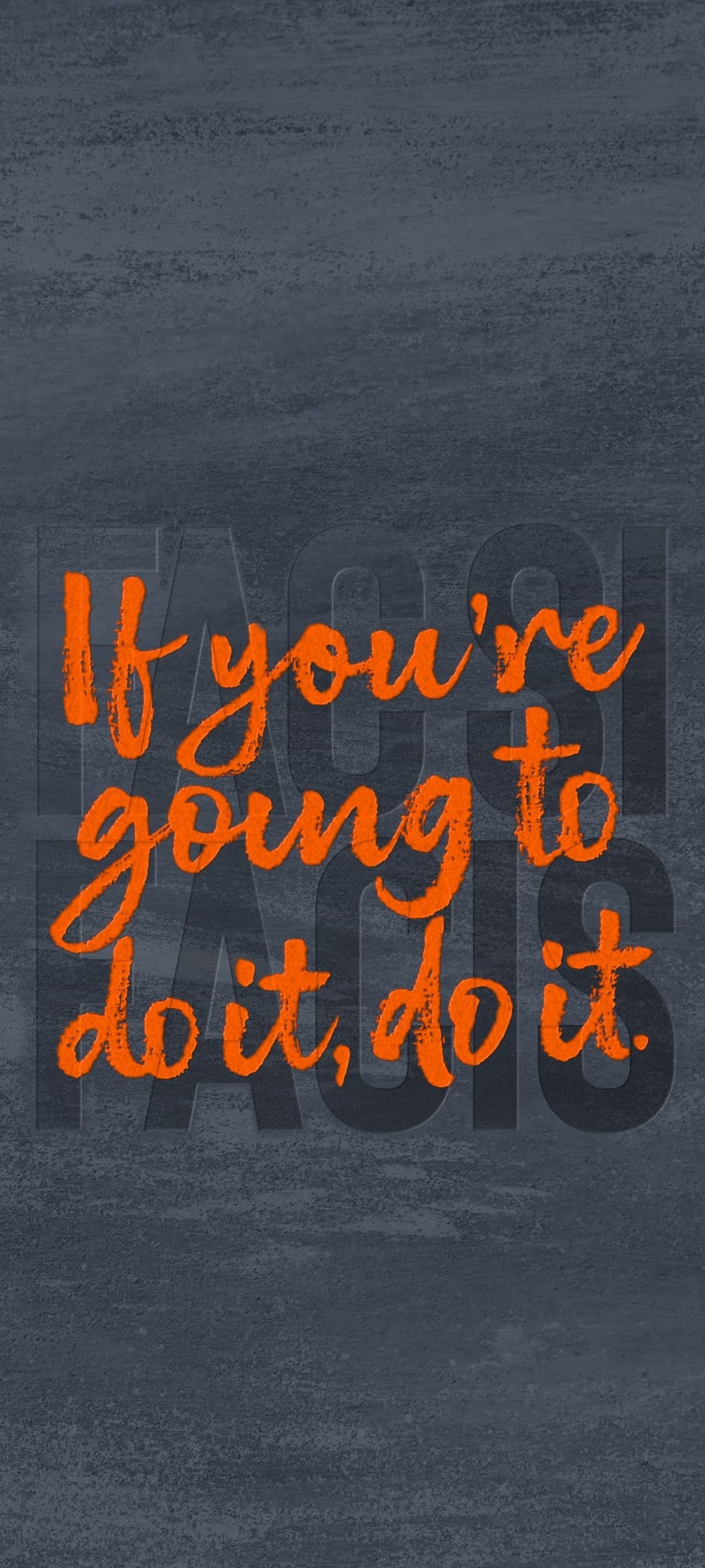 Orange block lettering with a motivational quote centered on a dark charcoal grey textured surface.