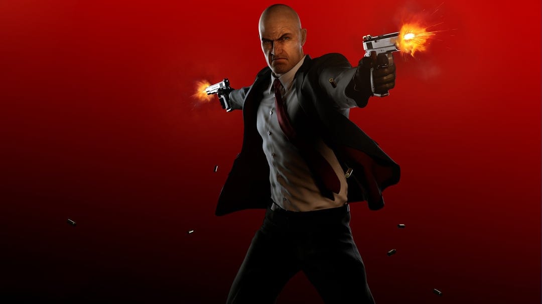 Bald assassin Agent 47 fires dual silver pistols with muzzle flashes against a solid red background.