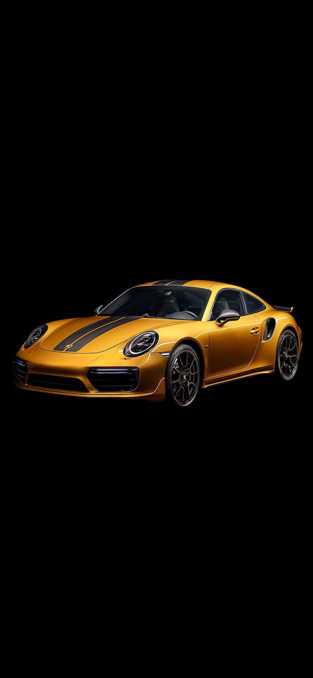 Gold Porsche 911 Turbo S with black racing stripes centered on a solid dark background in portrait mode.