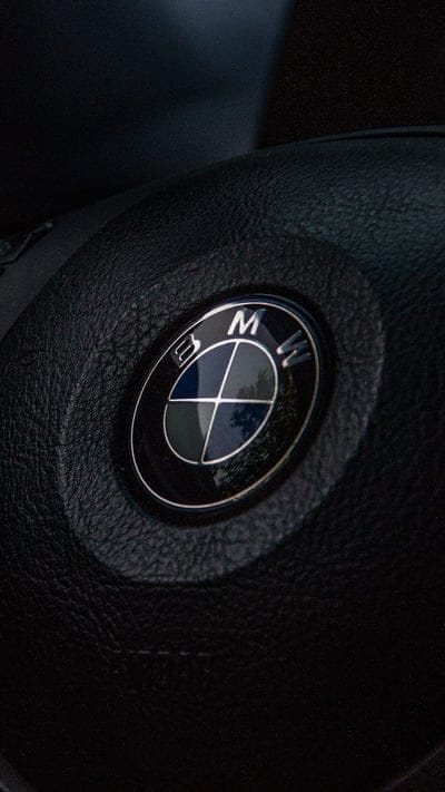 BMW Logo, badge, bmw, car, emblem, interior, logo, steering, steering wheel, vehicle, wheel, mobile wallpaper, android wallpaper, iPhone wallpaper, phone wallpaper