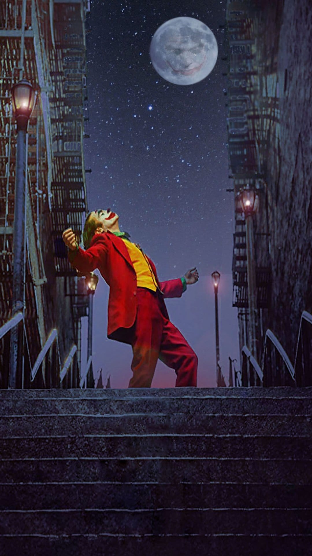 Joker dances on steep city steps with his head tilted toward a smiling moon in a dark, starry night sky.