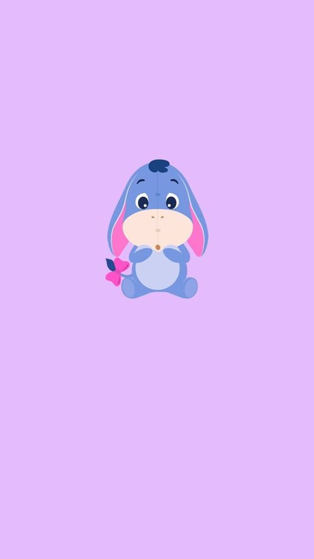 Baby Eeyore sits with a pink bow tied to his tail against a solid lilac backdrop in a serene portrait pose.