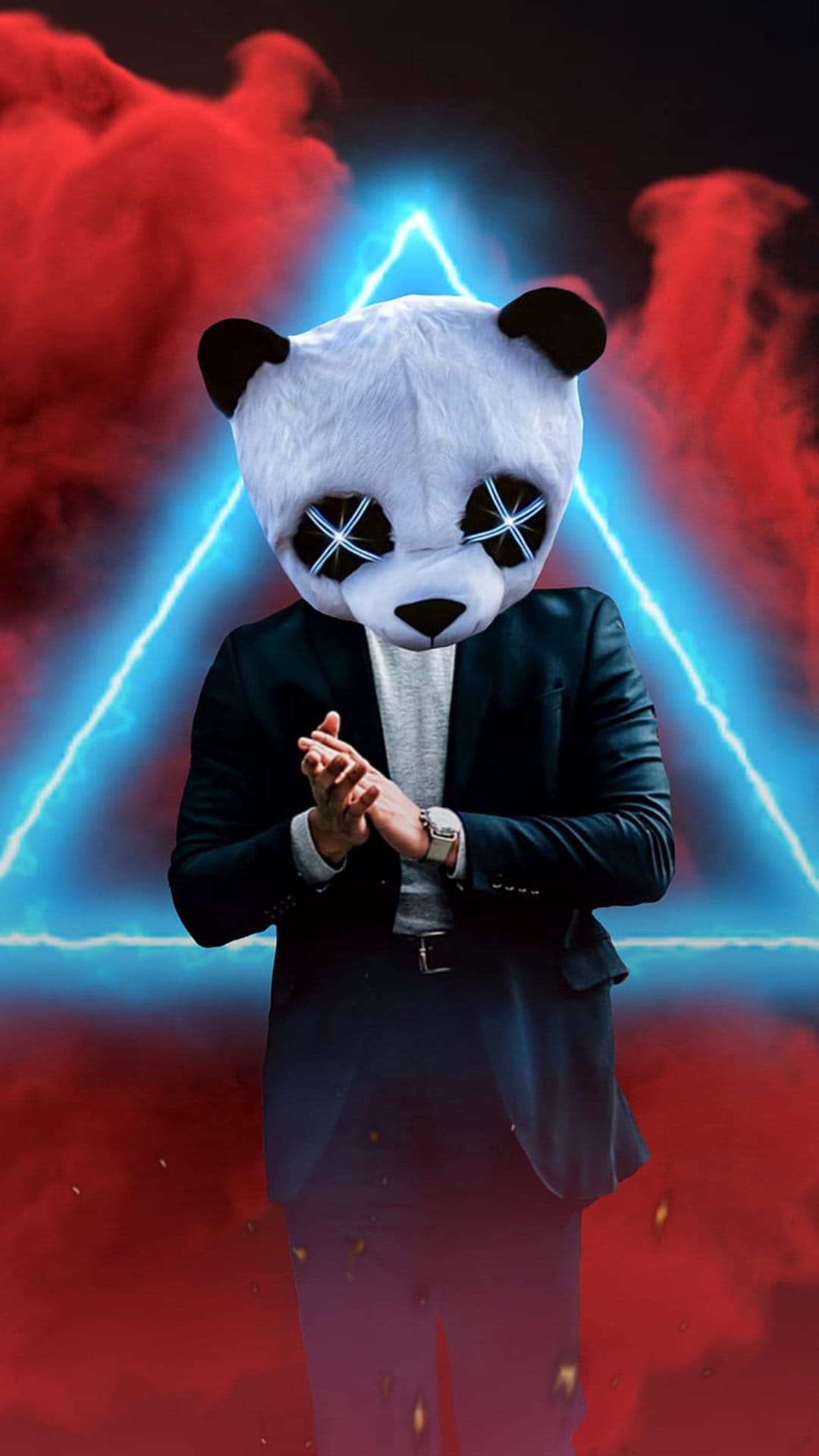 Masked figure in a suit with glowing blue X eyes stands before a luminous neon triangle and red smoke clouds.