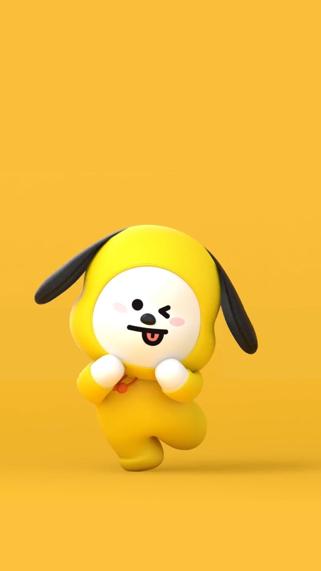 Chimmy the yellow BT21 puppy winking with his tongue out against a solid yellow backdrop in a 3D rendered style.