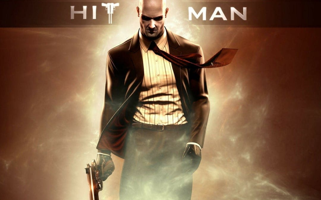 Agent 47 in a suit holding a pistol against a smoky gold background with his red tie blowing in the wind.