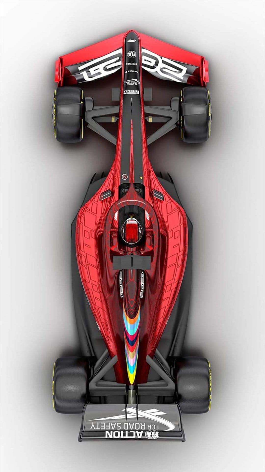 Red Formula 1 car seen from above with a black center stripe, yellow tire accents, and colorful rear detailing.