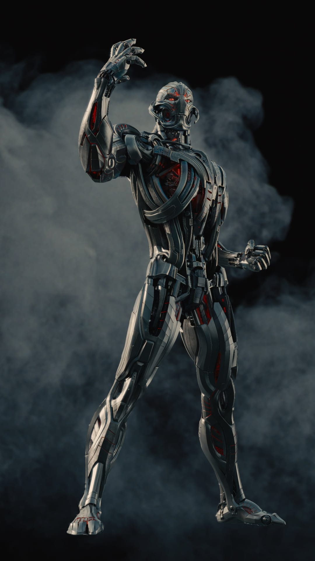 Ultron stands with glowing red eyes and detailed silver armor surrounded by swirling clouds of gray smoke.