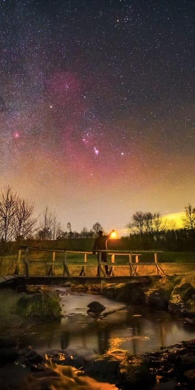 Milky Way, Night sky, Bridge, Stream, Stars, Cosmic, Lantern light, Astrophotography, Celestial, Landscape, Outdoors, Purple sky, Orange glow, Reflections, Tranquil, Night, Ethereal, Wilderness, Astronomy, Nature