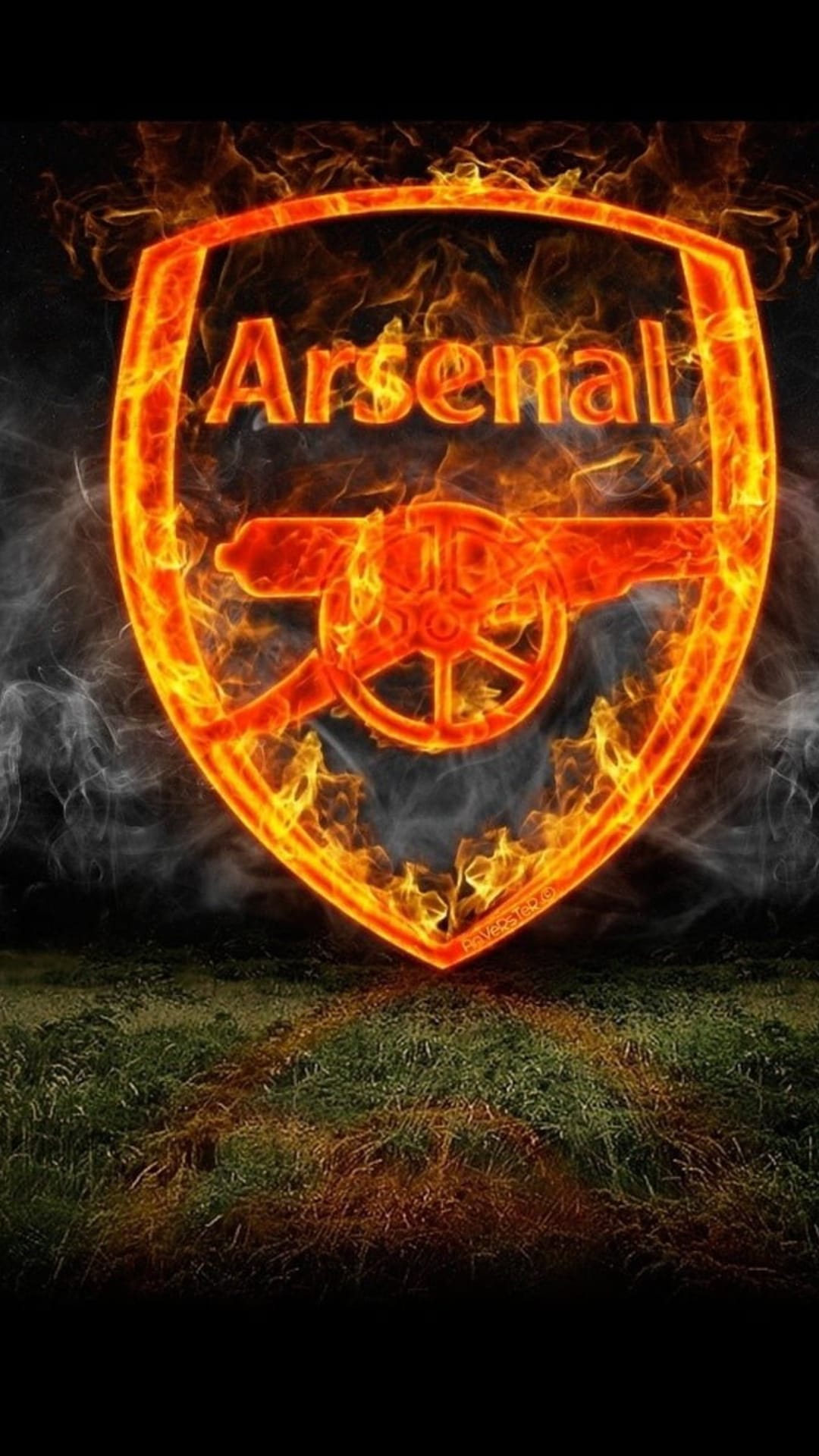 Arsenal FC shield with a gold cannon engulfed in orange flames over a dark smoky background and green grass.