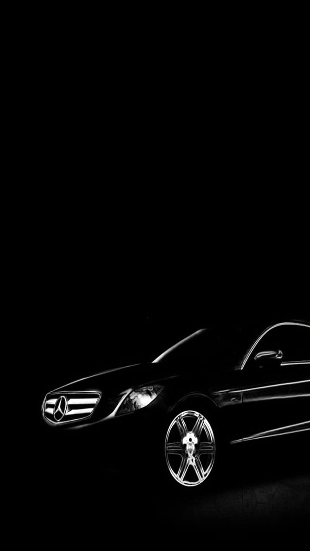 Mercedes-Benz sedan silhouette featuring a chrome grille and alloy wheel spokes against a dark background.