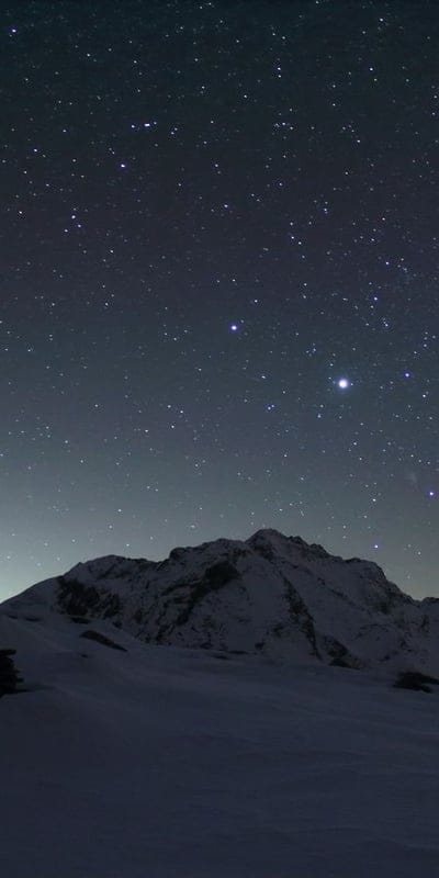 Mountains, Snow, Night, Stars, Landscape, Winter, Peaks, Celestial, Outdoors, Serene, Dark Sky, Wilderness, Scenic, Cold, Tranquility, Horizon, Vista, Starlight, Nature, Majestic