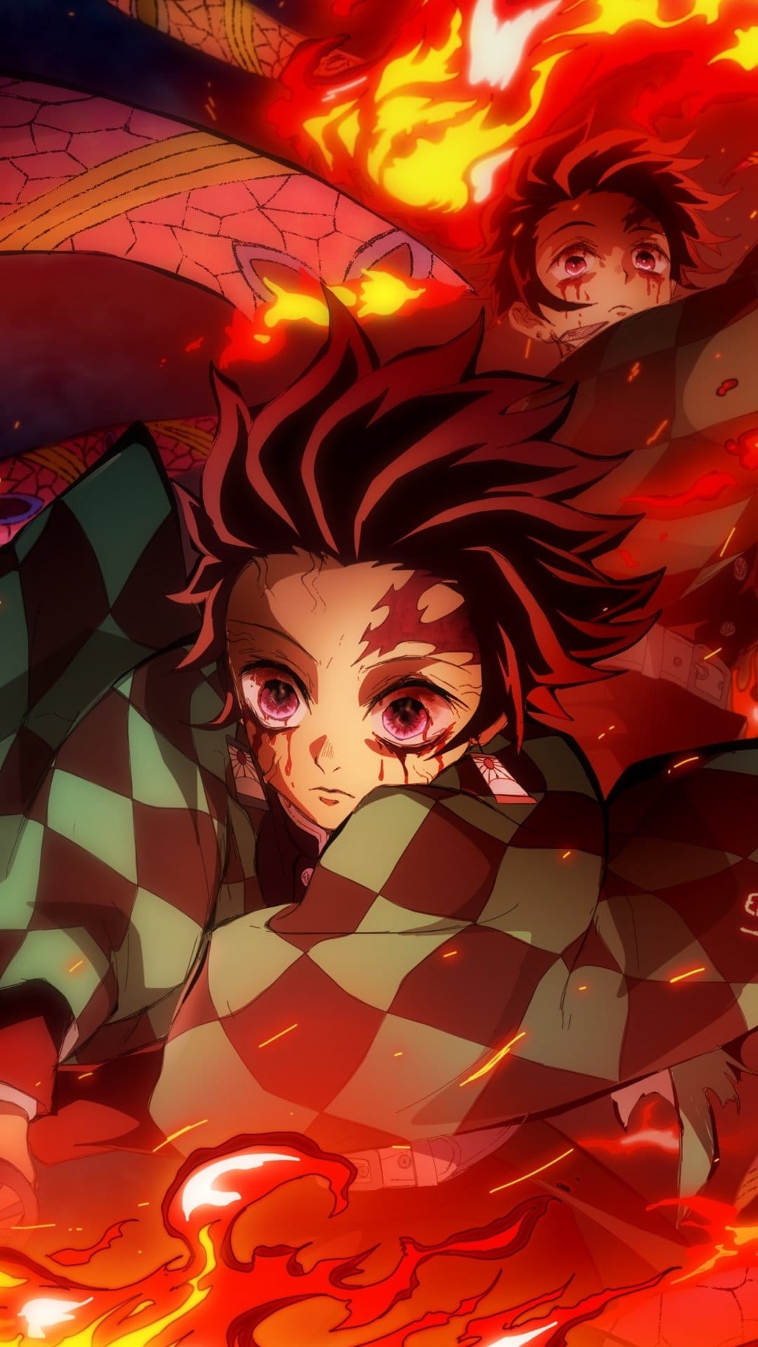 Tanjiro Kamado with a blood-splattered face and crying eyes surrounded by swirling orange Hinokami Kagura flames.
